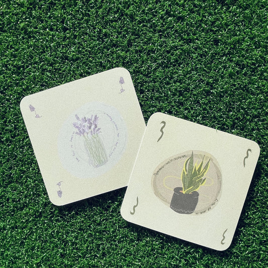 lavender and snake plant print on green fake grass