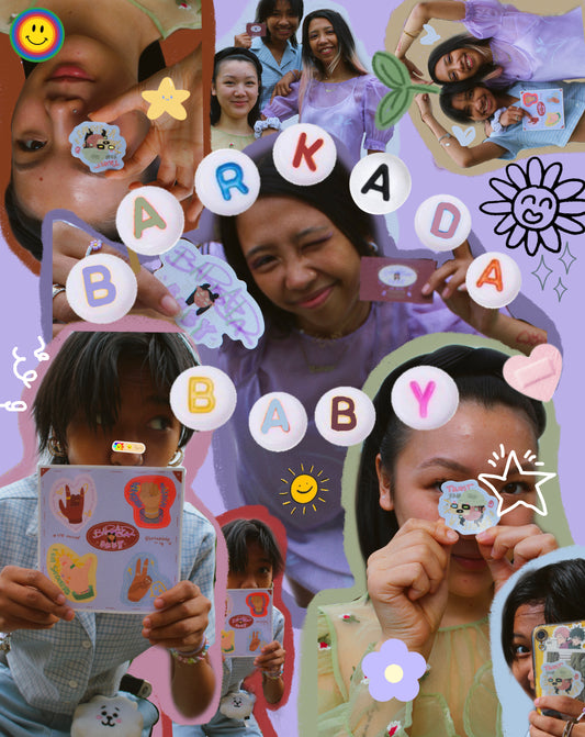 purple background with friendship bracelet beads spelling “Barkadababy”. there is a collage of three people wearing blue, purple, and green pastels holding various stickers. the photo is adorned with different stickers